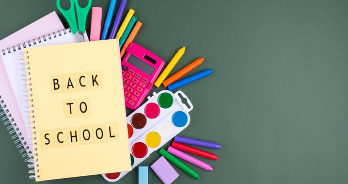 back-school-background-with-school-supplies-notebook